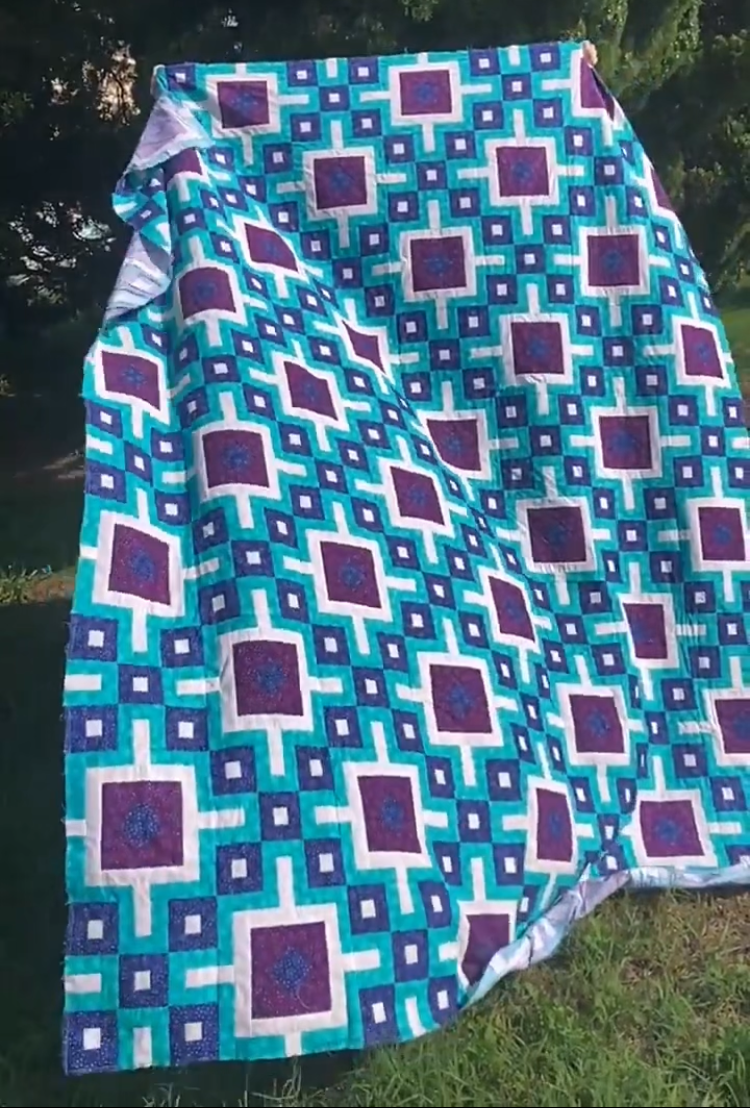 Lisboa Quilt blowing in the wind.