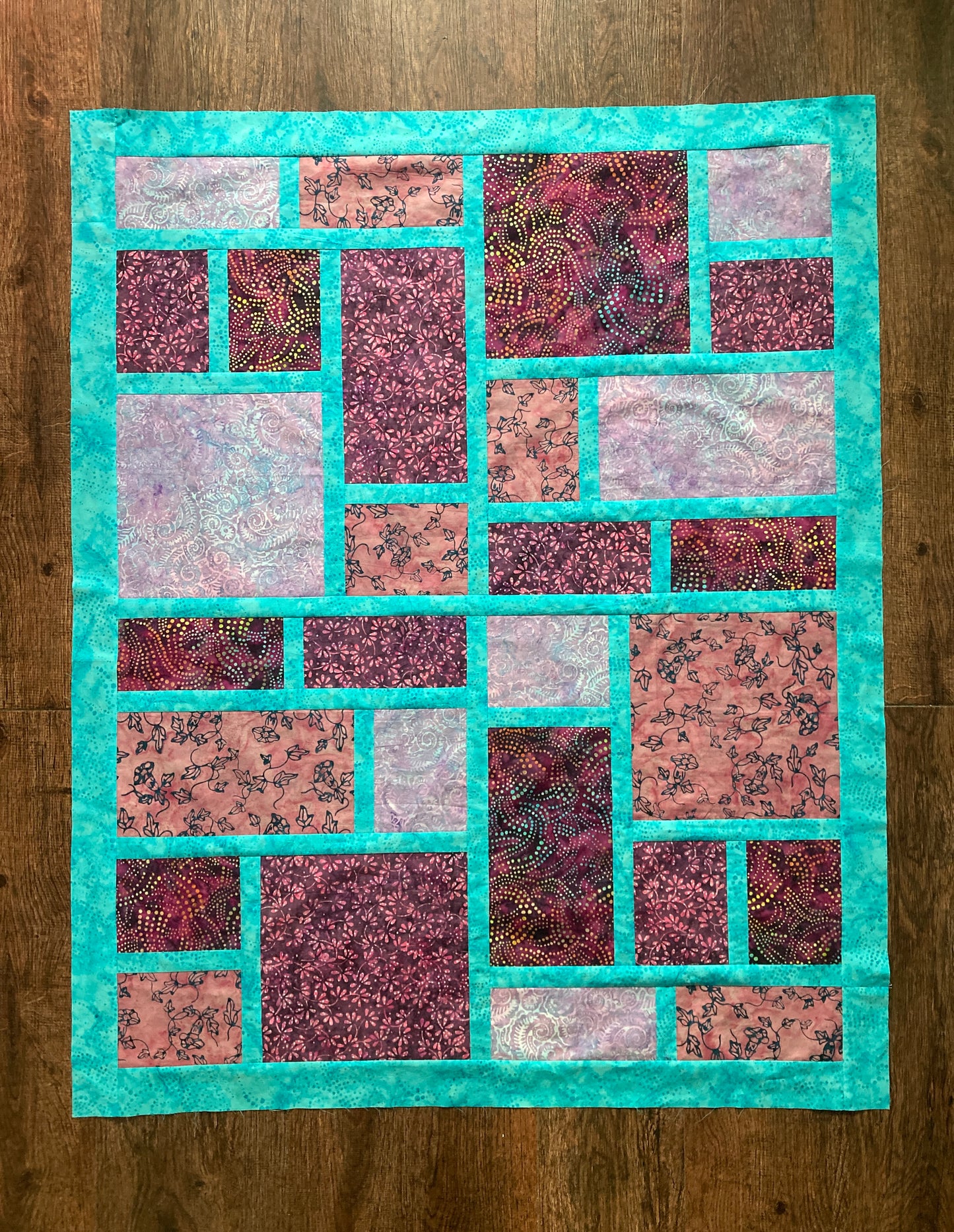 Slea Head Quilt, Baby size in purple and teal.